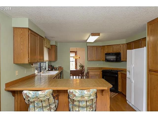 12210 SW North Dakota St - Thumbnail 3