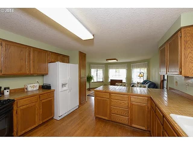 12210 SW North Dakota St - Thumbnail 4